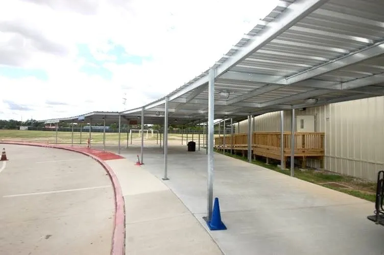 Commercial walkway canopy installed by Kool Covers
