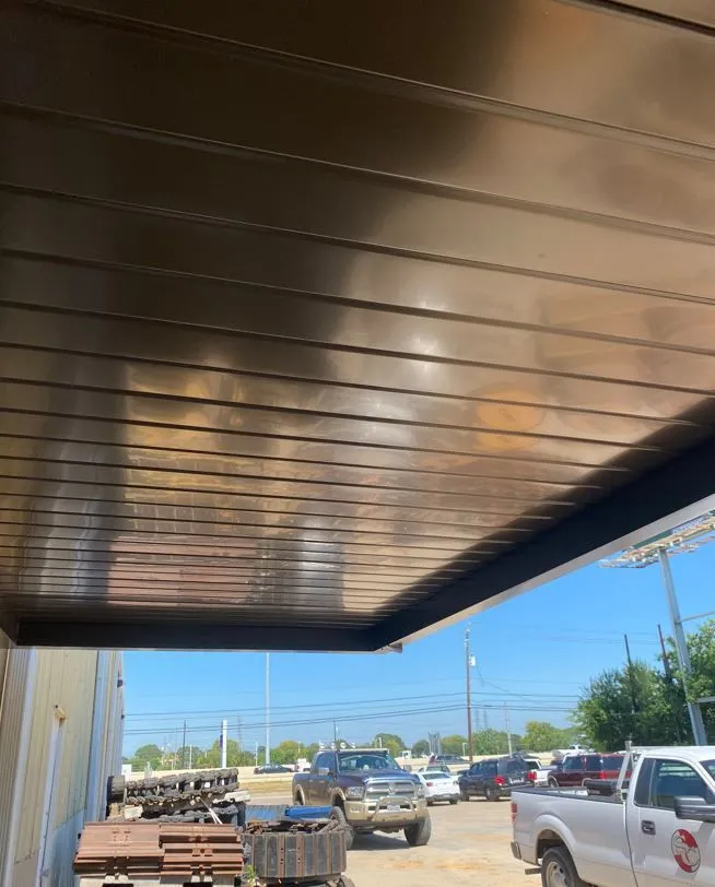 Overhead commercial canopy installed by Kool Covers