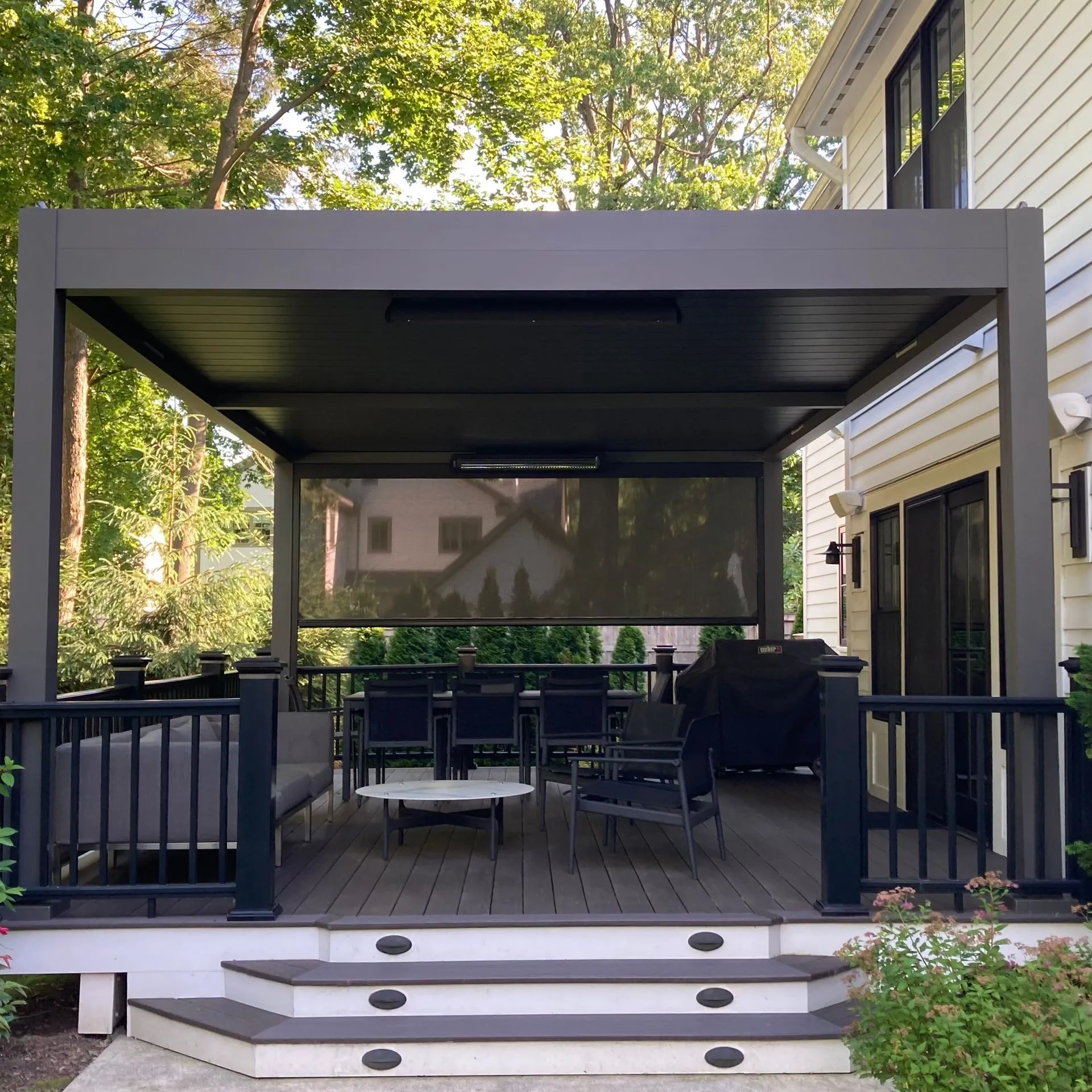 Louvered pergola with adjustable roof installed by Kool Covers