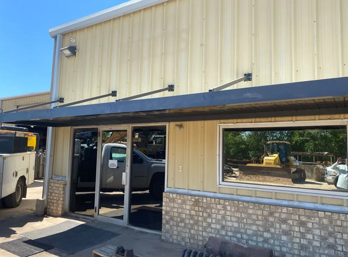 Overhead commercial canopy installed by Kool Covers