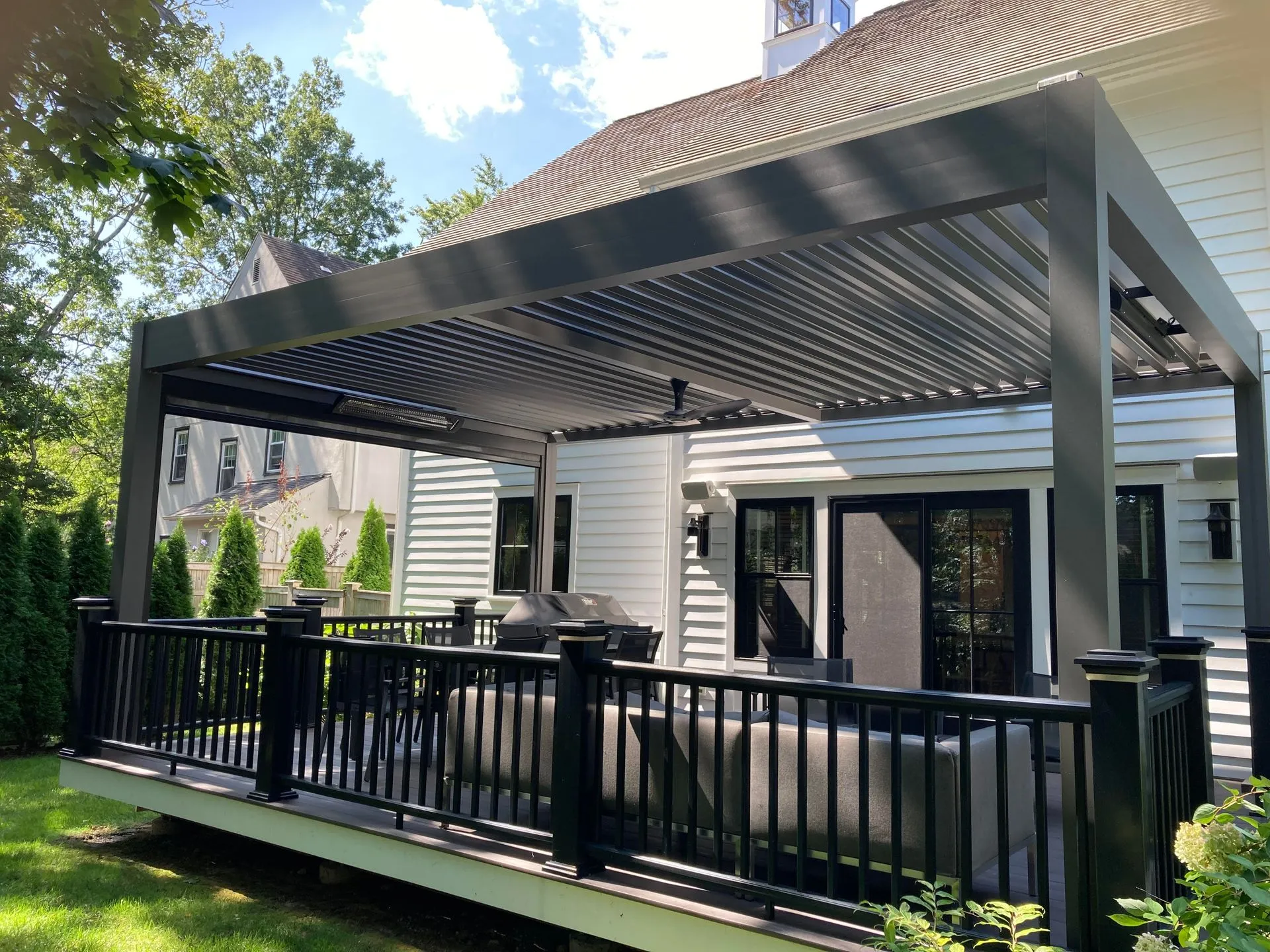 Louvered pergola with adjustable roof installed by Kool Covers