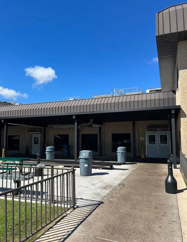 Overhead commercial canopy installed by Kool Covers