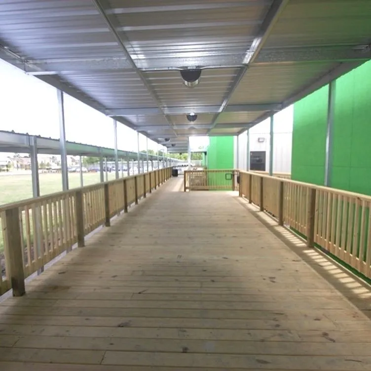 Commercial walkway canopy installed by Kool Covers