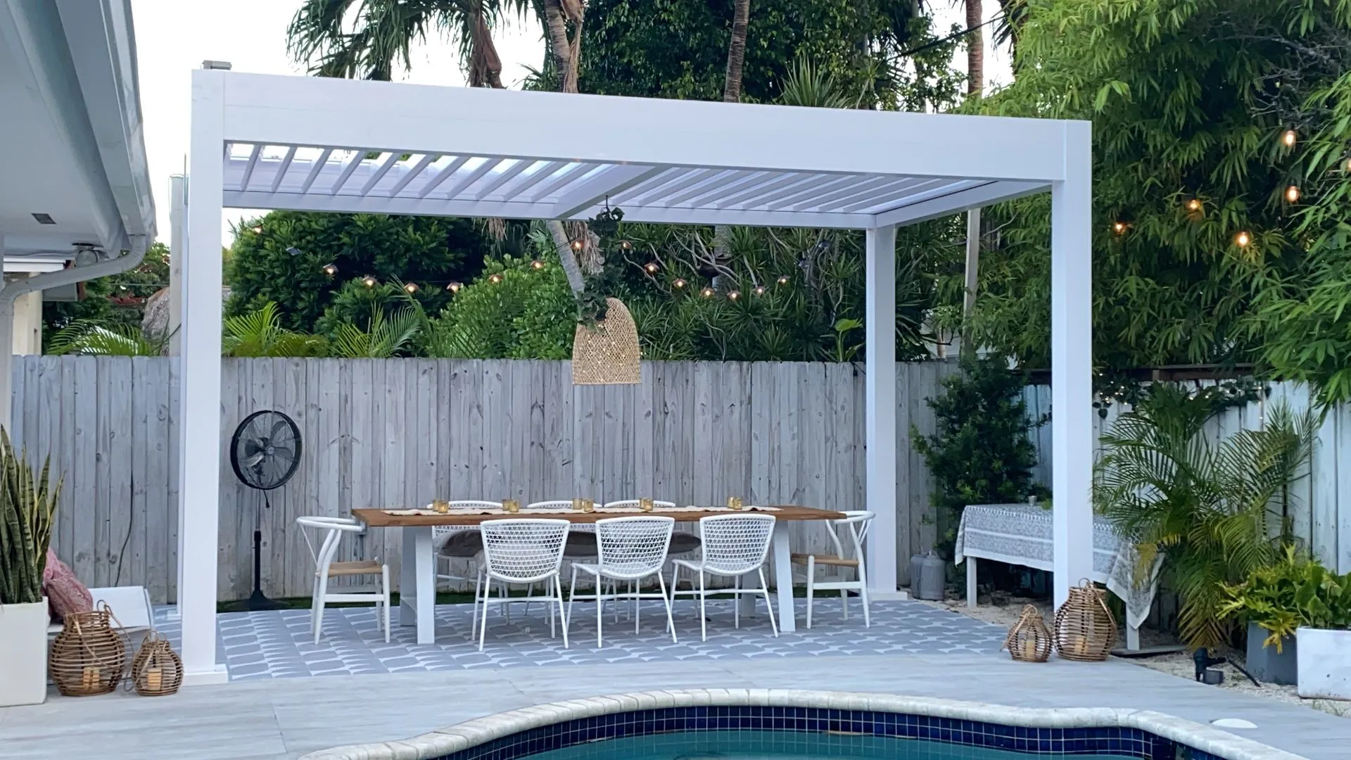 Louvered pergola with adjustable roof installed by Kool Covers